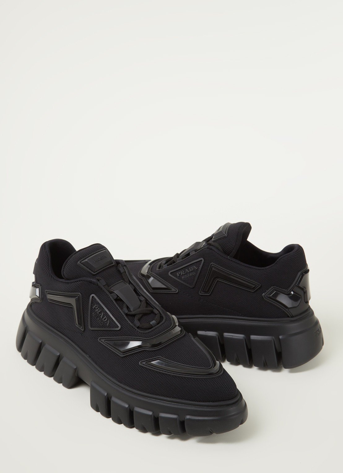 Sneaker avec détails en maille Prada 790€