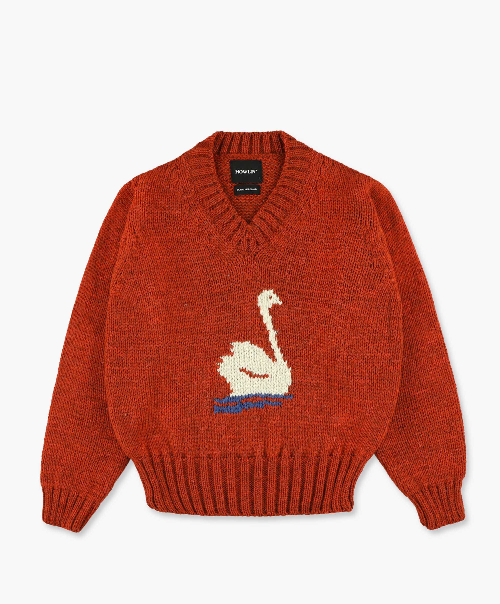 Pull orange avec un cygne imprimé