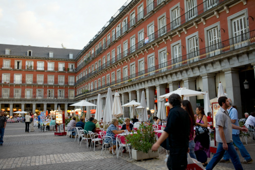 Tourists at a sidewalk cafe, Plaza Mayor, Madrid, Spain